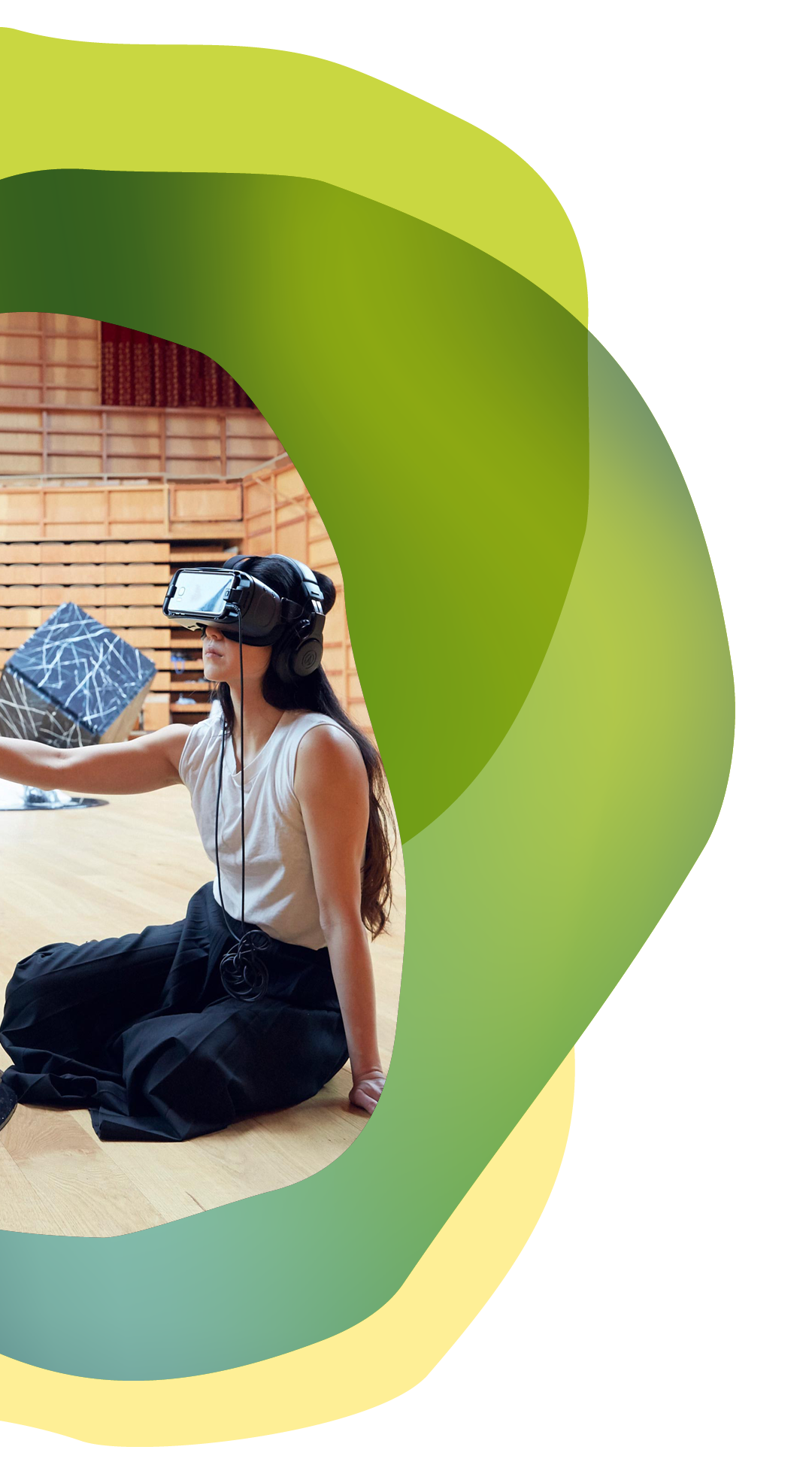 girl on VR machine sitting on the floor